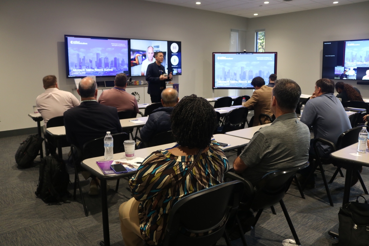 UnifiedCommunications.com Summit photo, Ryan Herbst gives a talk to the audience.